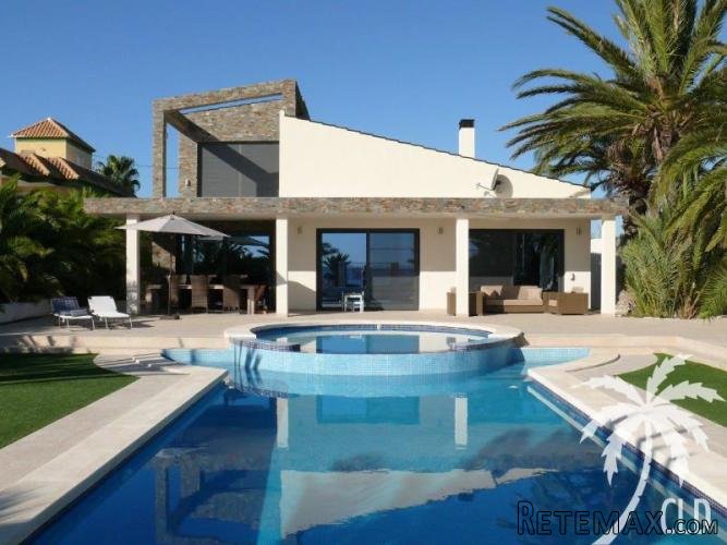 This beautiful villa is located on the sandy beach of the..