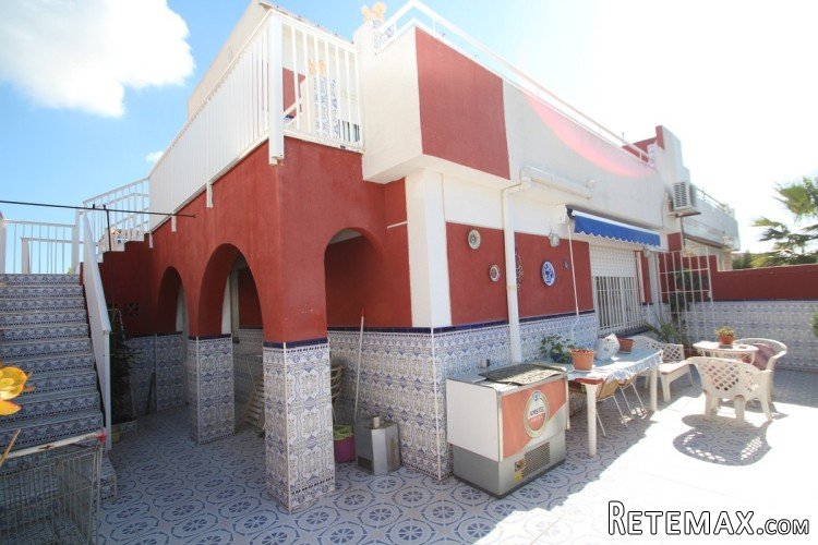 This semi-detached house is located next to the commercial..