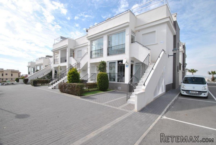 This modern ground floor apartment is located in bustling..