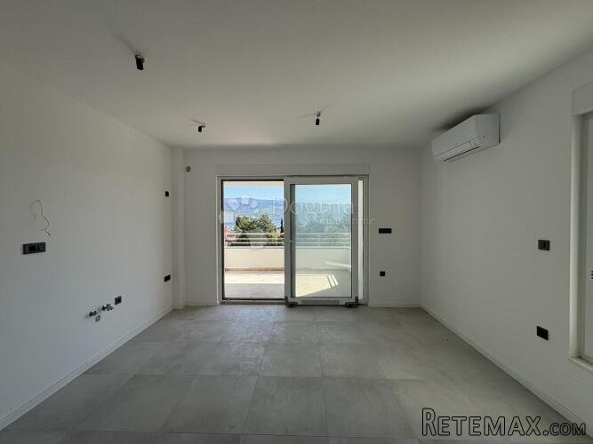 NOVOGRADNJA - APARTMAN U PRIZEMLJU SA OKUĆNICOM - 2