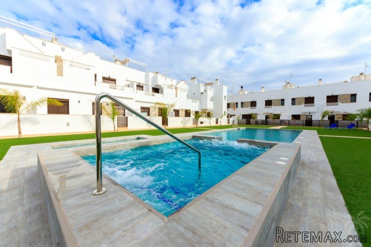 These modern, terraced houses are being built in a very..