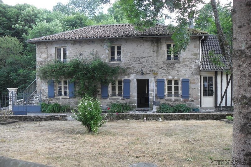 Character House by a River - 2
