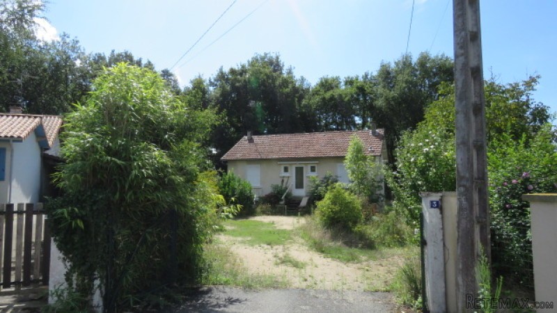 Bungalow with large garden at the end..