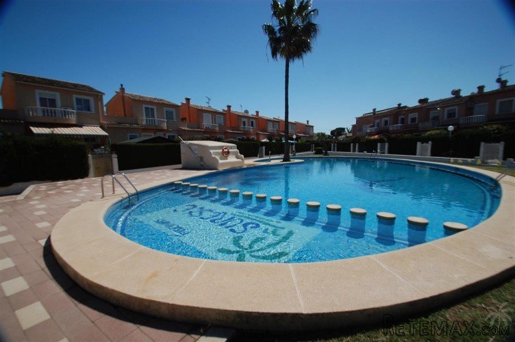Great price for this bright duplex with a private plot of..