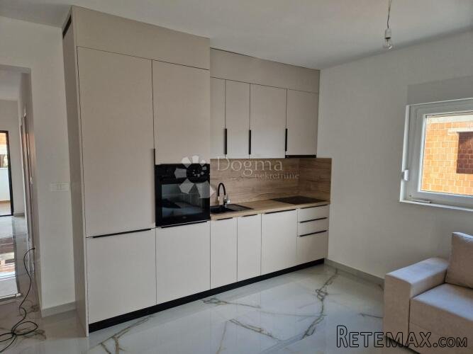 Dvoetažni apartman u novogradnji u Palitu.