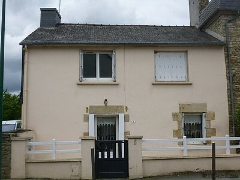 Village house with garden and garage..